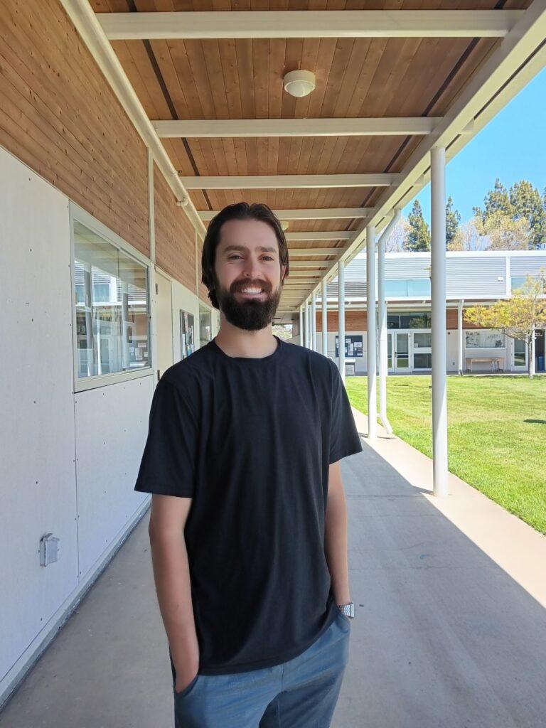 Dante Calcagno, 26, a student taking the portrait photography class. Photo by Ava Deutsch.